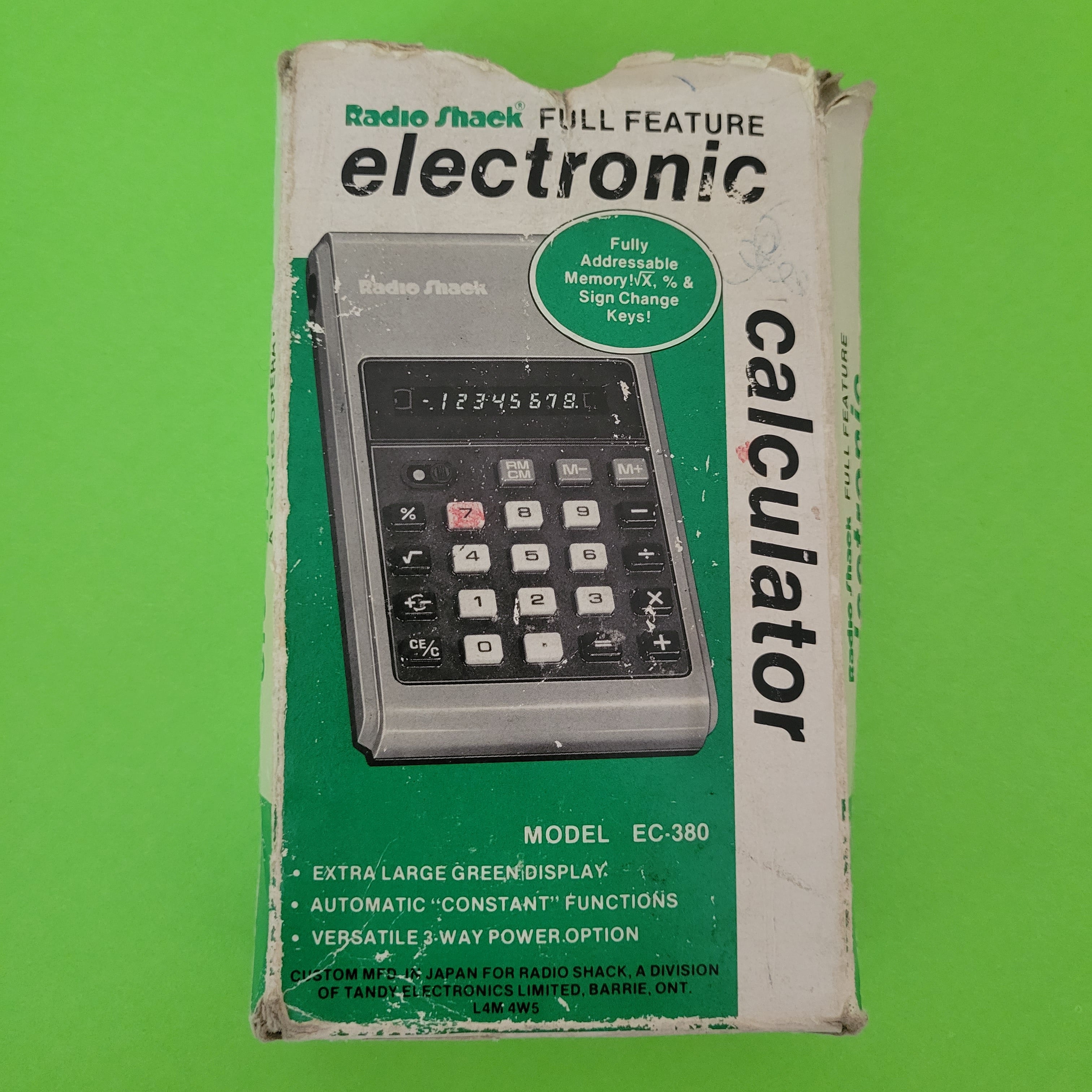 An image of the box of a Radio Shack EC-380 Four Function plus calculator